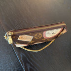 Louis Vuitton Travel Pouchette