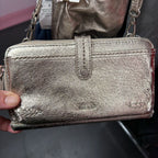 The Sak Metallic wallet cross body
