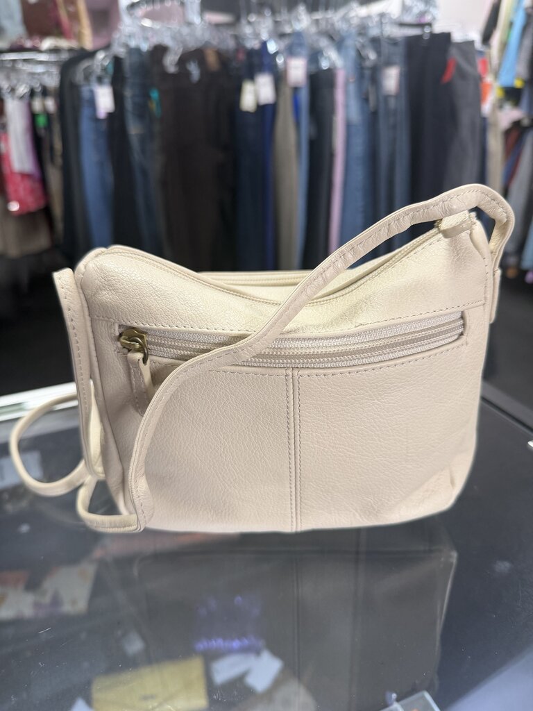 Damage noted to strap Stone Mountain Small Leather Crobbody