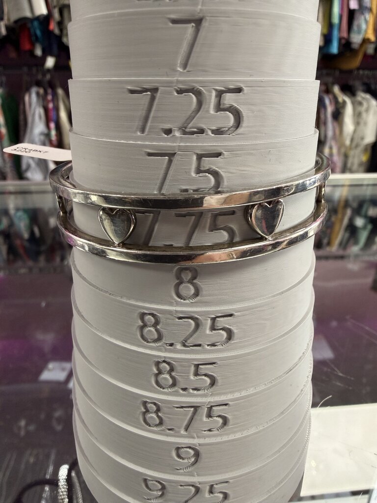 Tiffany & Co. 925 Seven Hearts Bangle Bracelet