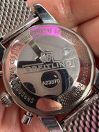 2012-2013 Breitling Superocean Heritage Chronograph A23370 — 44mm, stainless steel, silver dial, black bezel, on the mesh bracelet 2715/154A