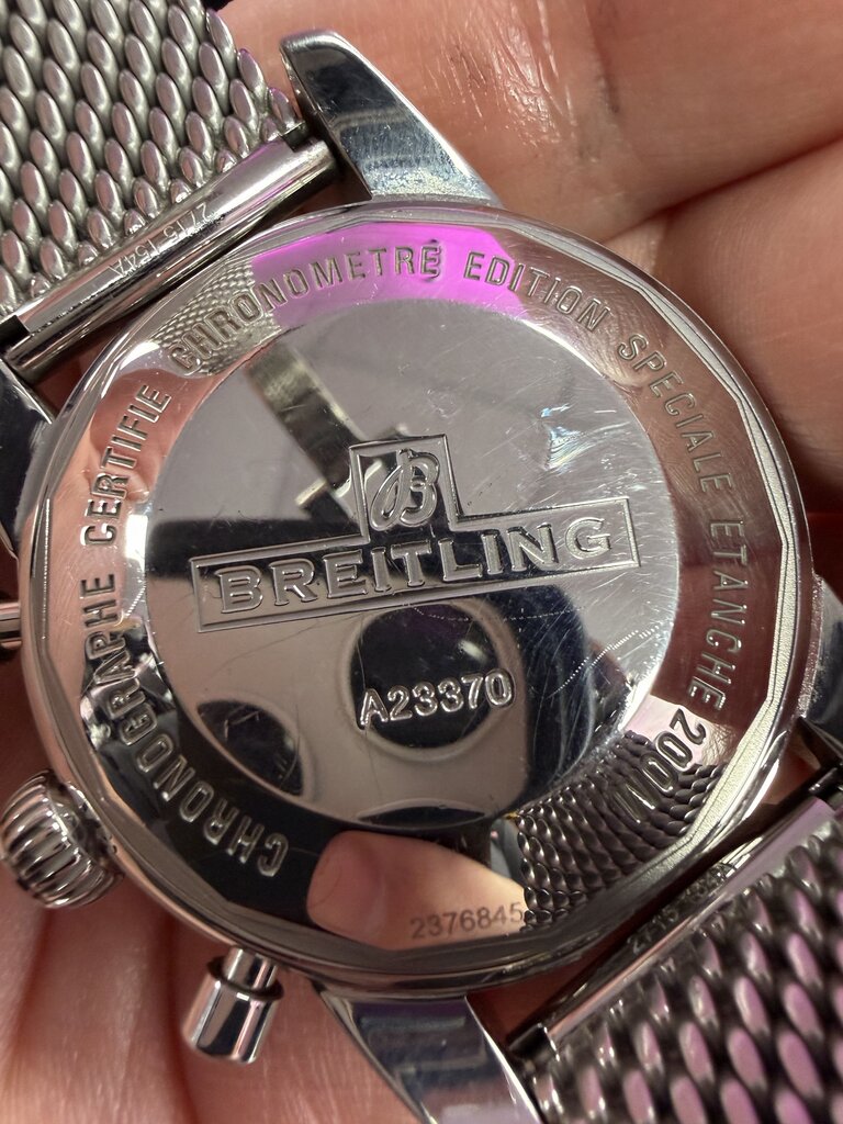 2012-2013 Breitling Superocean Heritage Chronograph A23370 — 44mm, stainless steel, silver dial, black bezel, on the mesh bracelet 2715/154A