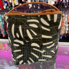 Brahmin Celina Bucket Cacti Green Abrigado Croc-Embossed Leather Cutouts Over Neutral Linen