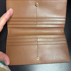 Michael Kors Carson Large pebbled Leather Wallet Buckle Detail