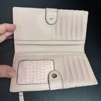Kate Spade Laurel Way Bow Stud Wallet