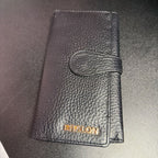 Estalon Pebbled Leather Fold Over Wallet