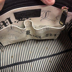 L.A.M.B. Gwen Stefani Alchemy Handbag
