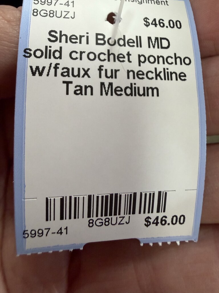MD solid crochet poncho w/faux fur neckline