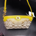 Coach Signature Jacquard Turnlock Mini Wristlet Bag